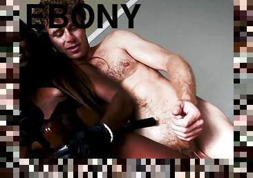 Slim ebony fucks her man with a strap-on dildo