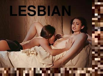 Abigail Mac and Sabina Rouge pleasuring each other in bed