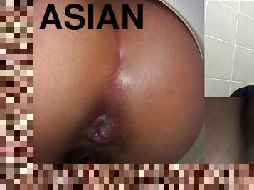 asian peeing on stick