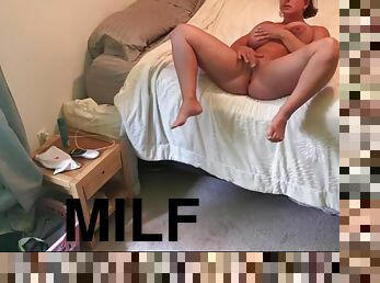 Hot MILF masturbates in the motel