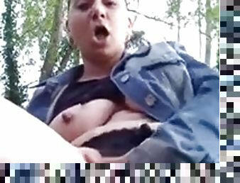 Fingering my pussy in nature and showing my boobs in public