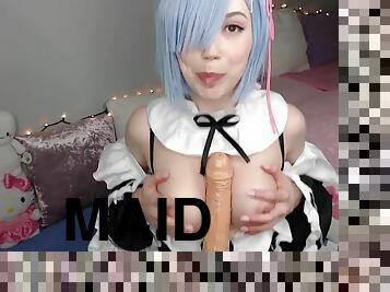 Blue-haired cutie in a maid's uniform blows a big dildo