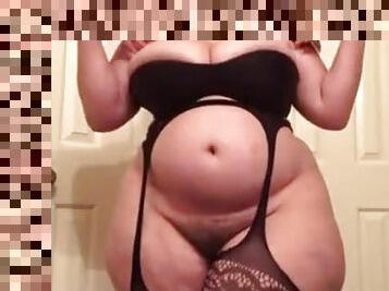 Obese hottie puts on lingerie to underline her beauty
