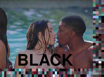 Two shameless white girls sucking off two black guys in the pool