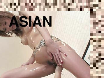 Big pussy lips Asian milf getting oiled up and fingerfucked