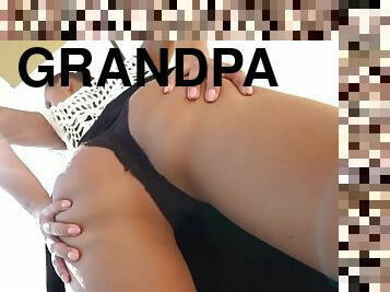 Teen blowing old grandpa