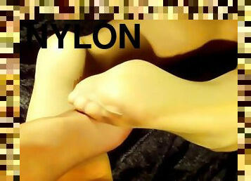 2 nylon clad women being playfull