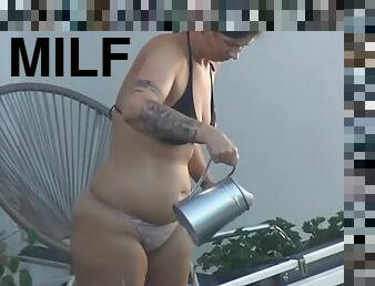 Milf work at balcony and take off her clothes