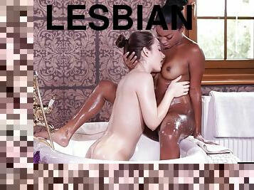 Watch this cute interracial lesbian couple have passionate sex