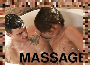 Young gal provides excellent massage in the tub