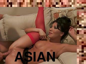 Horny asian milf rides young stud style cowgirl on the couch