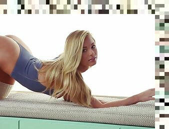 Erotic blonde babe Nikki Leigh demonstrates her slender naked shape