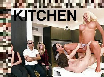 Dirty babes are fucking the same dude in the kitchen
