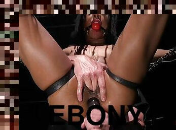 Ebony ballgagged sub anallytoyed in BDSM suspension bondage