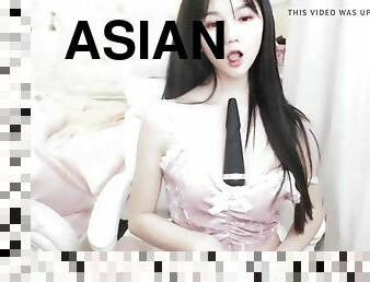 Asian babe teases her hipples in lingerie