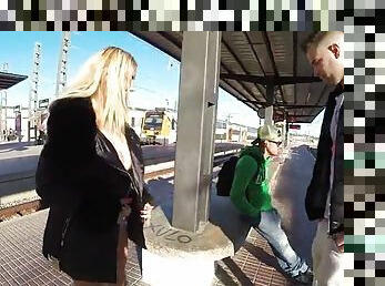 Kyra hot is flashing her big fake boobs on the railway platform