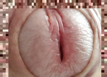 Gentle stroking of uncut cock (close up)