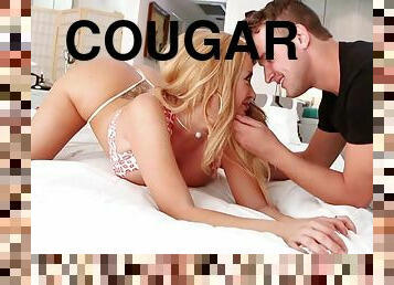 Sexy cougar and her boy toy get busy