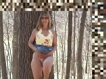 Hottie strips in woods. this is not owned by me