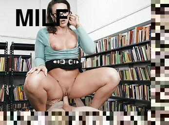 Dark-haired MILF with glasses gets fucked in the library