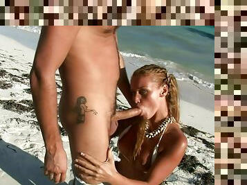 This Couple Relaxes On The Tropical Beach And Has Oral