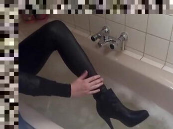 Sexy tight pants ankle boots and heels in bath