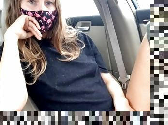 Masked girl plays with her pussy in the car
