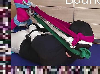 Soccer Player hogtied with lots of socks