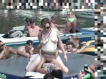 Girls eat pussy for an audience at lake party