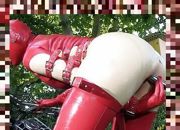 Lucy rocks the show in her red latex outfit