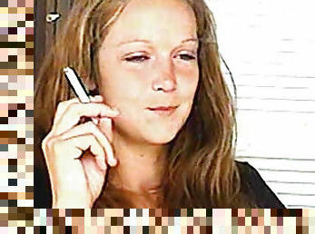 Young lady is smoking her sexy cigarette