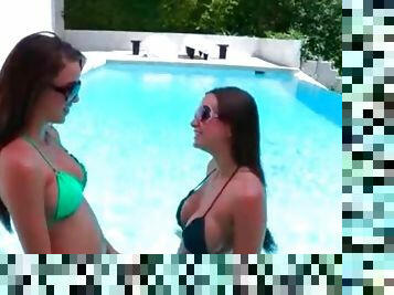 Bikini girls share lesbian kisses in the pool