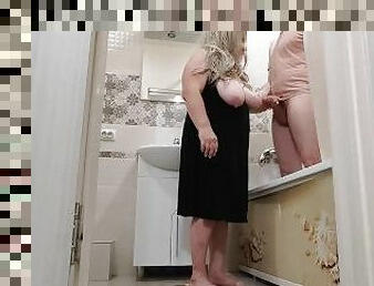 Stepmom got excited when she jerked off his cock in the bathroom and gave a blowjob before she asked