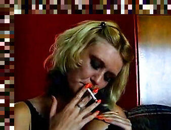 Smoking blonde in pantyhose solo