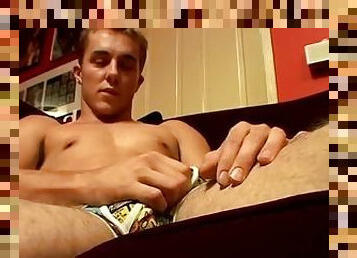 Blond jock Kelly Cooper fills his underwear with hot spunk