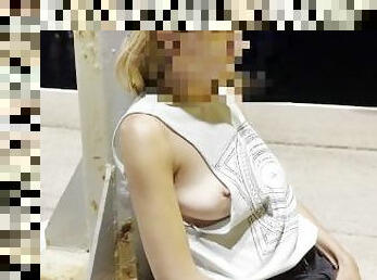 Night walking at the sea port with side cut shirt, showing tits and nipples in public around people