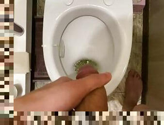 Barely managed to run, male pissing in the toilet