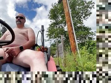 Almost caught by neighbors as I masturbate on my tractor