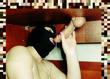 Glory hole under the table. MILF mask bdsm