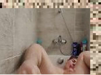 Cute boy sucks and fucks dildo in bathtub