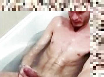 Taking a bath while showing off my big hung cock on camera
