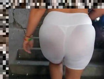 White see through shorts with white thong walking