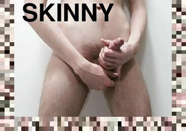 Skinny guy has fun after shower