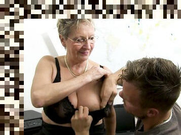 Old female takes younger man's dick for a few wild spins at work