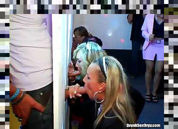 Pretty blondes go to a queue just to suck thick cocks through a gloryhole orgy